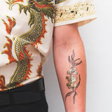 golden plant tattoo