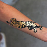 tatuaje tigre dorado