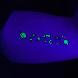 glow in the dark cosmos tattoo