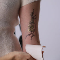 golden cherry blossom tattoo