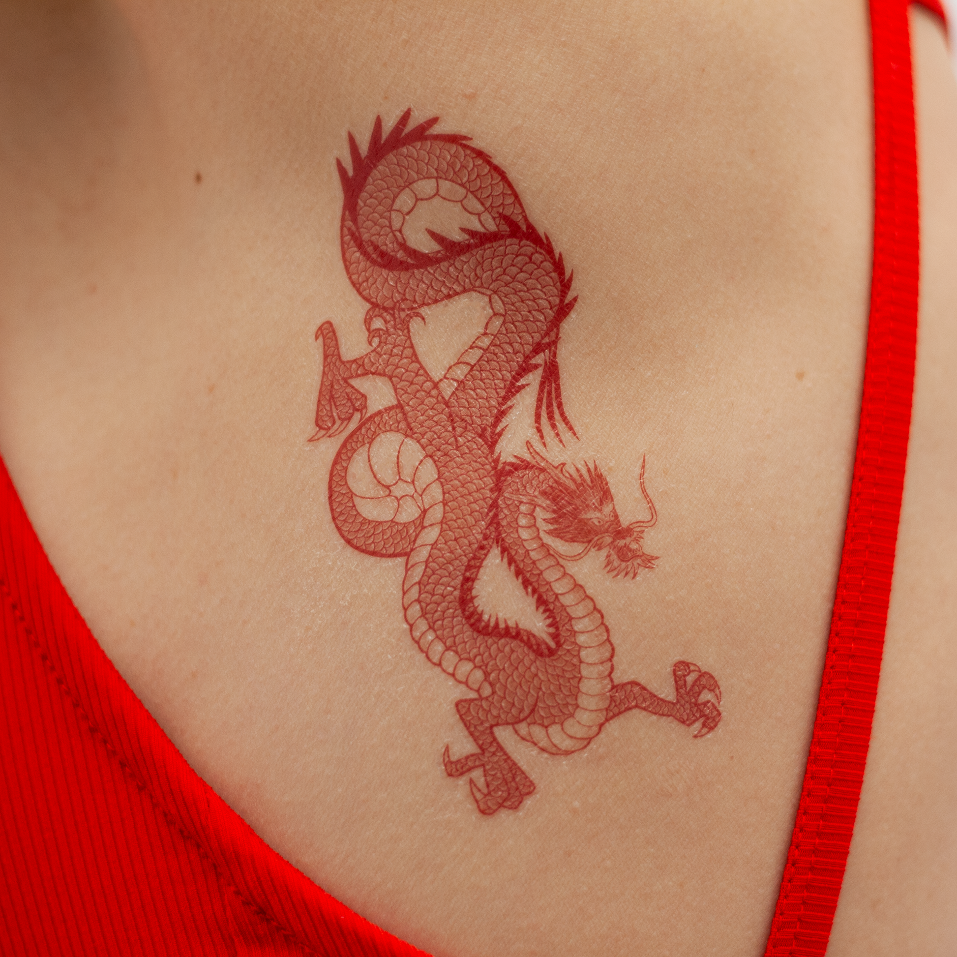 tatuaje dragon rojo tattoonie