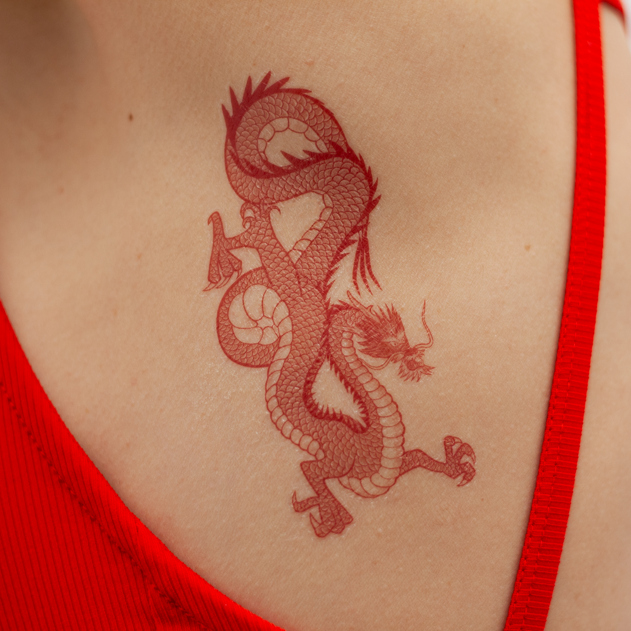 tatuaje dragon rojo tattoonie