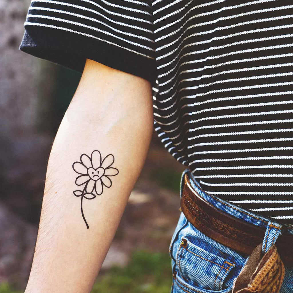 sad flower tattoo