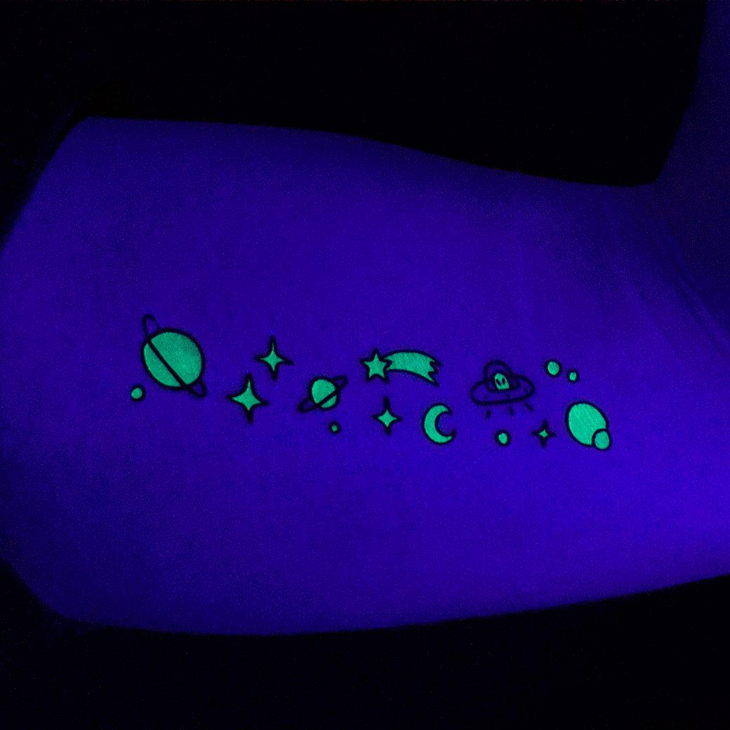 glow in the dark cosmos tattoo