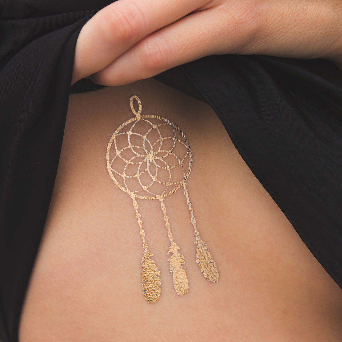 tatuaje dorado atrapasueños