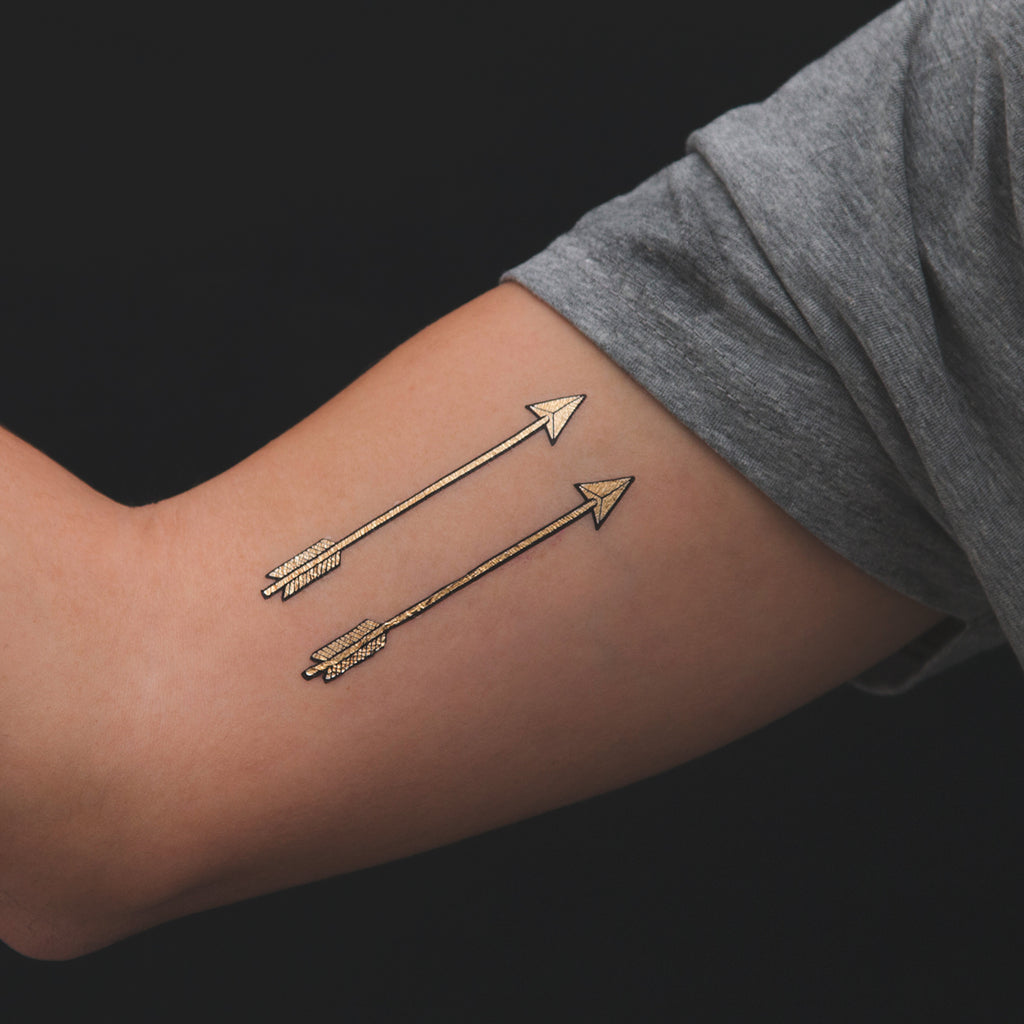 golden arrow tattoo