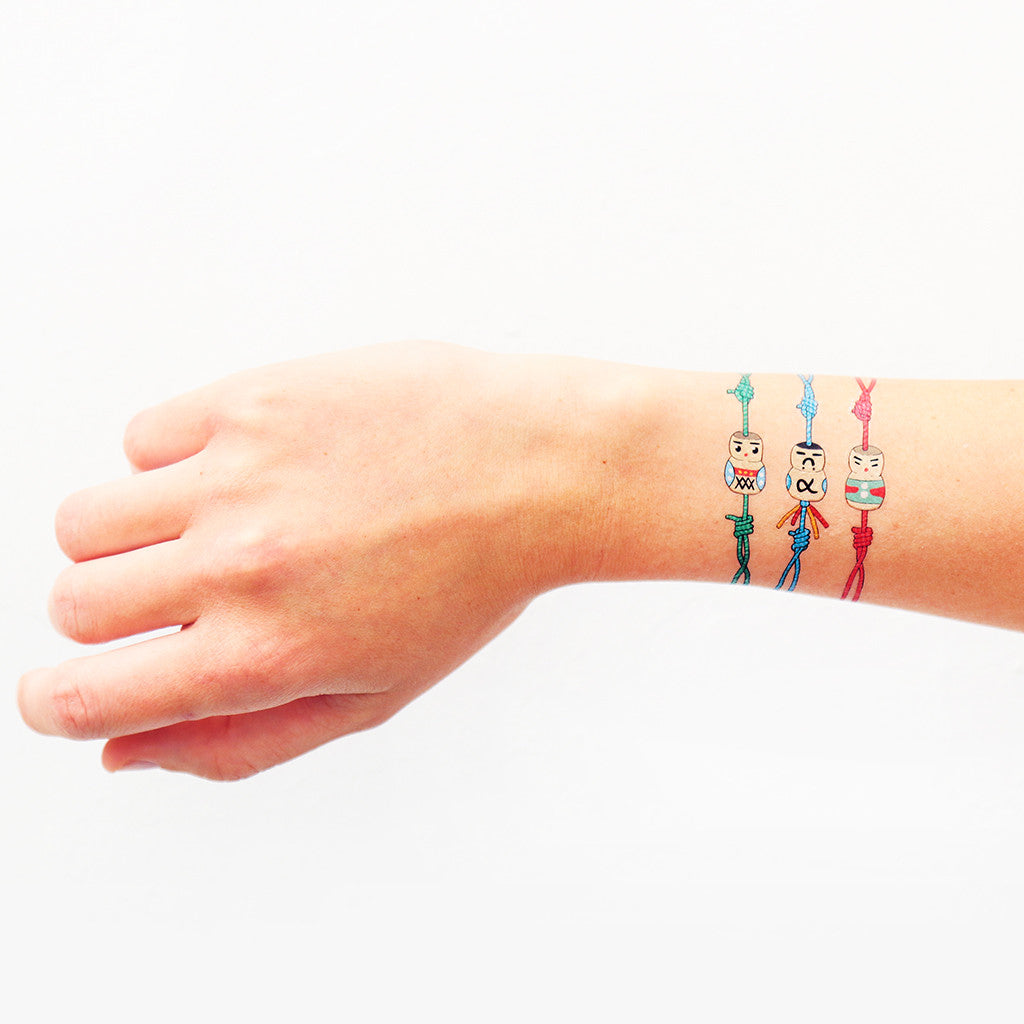 tatuaje brazalete de la suerte