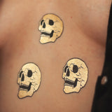 tatuaje calavera dorado
