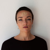 golden horus eye tattoo