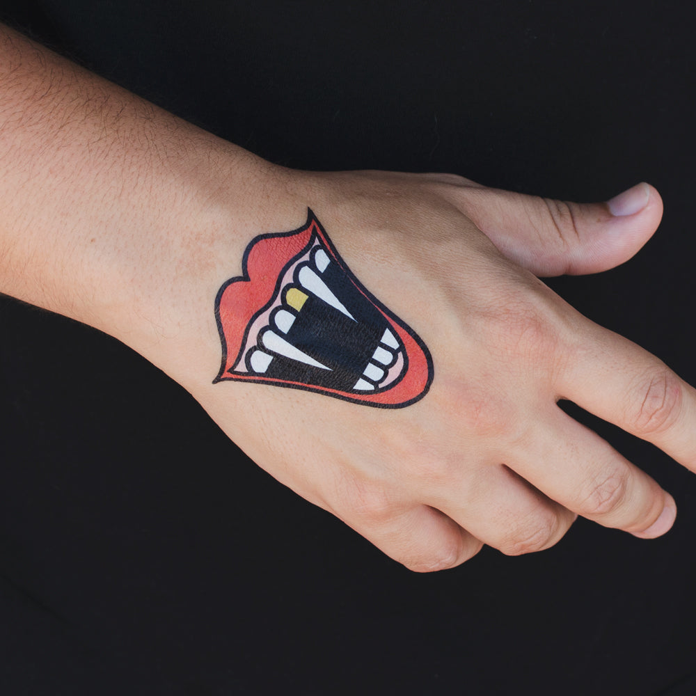 vampire mouth tattoo