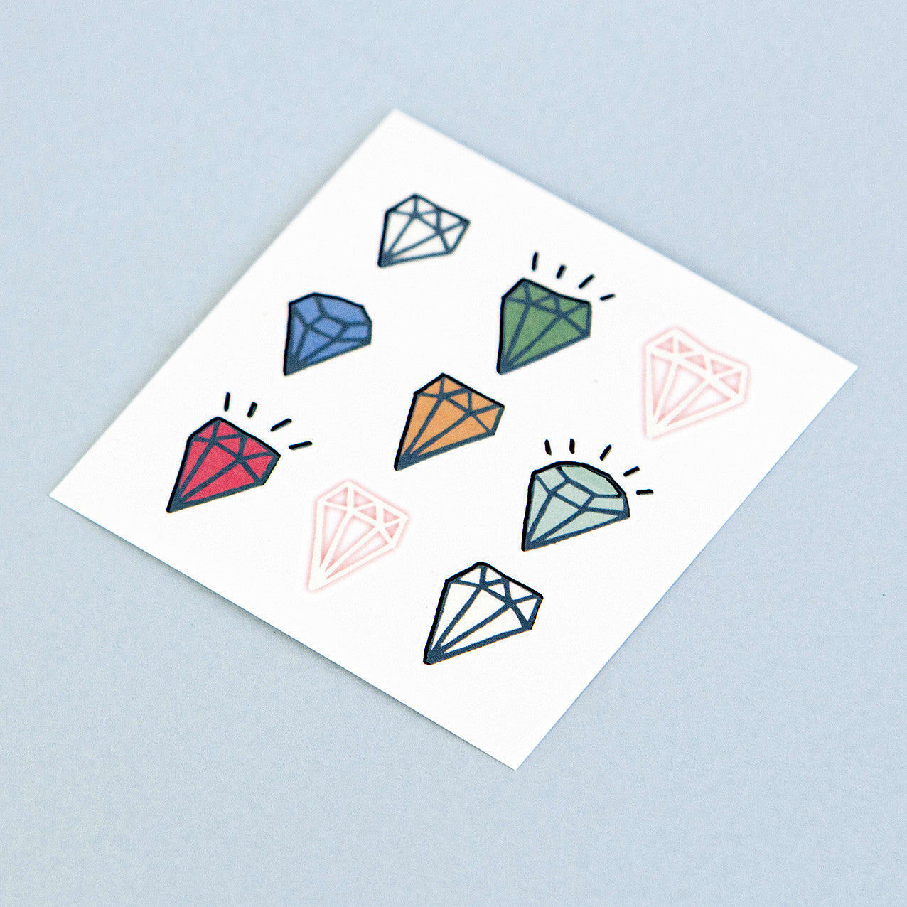 tatuaje diamantes colores