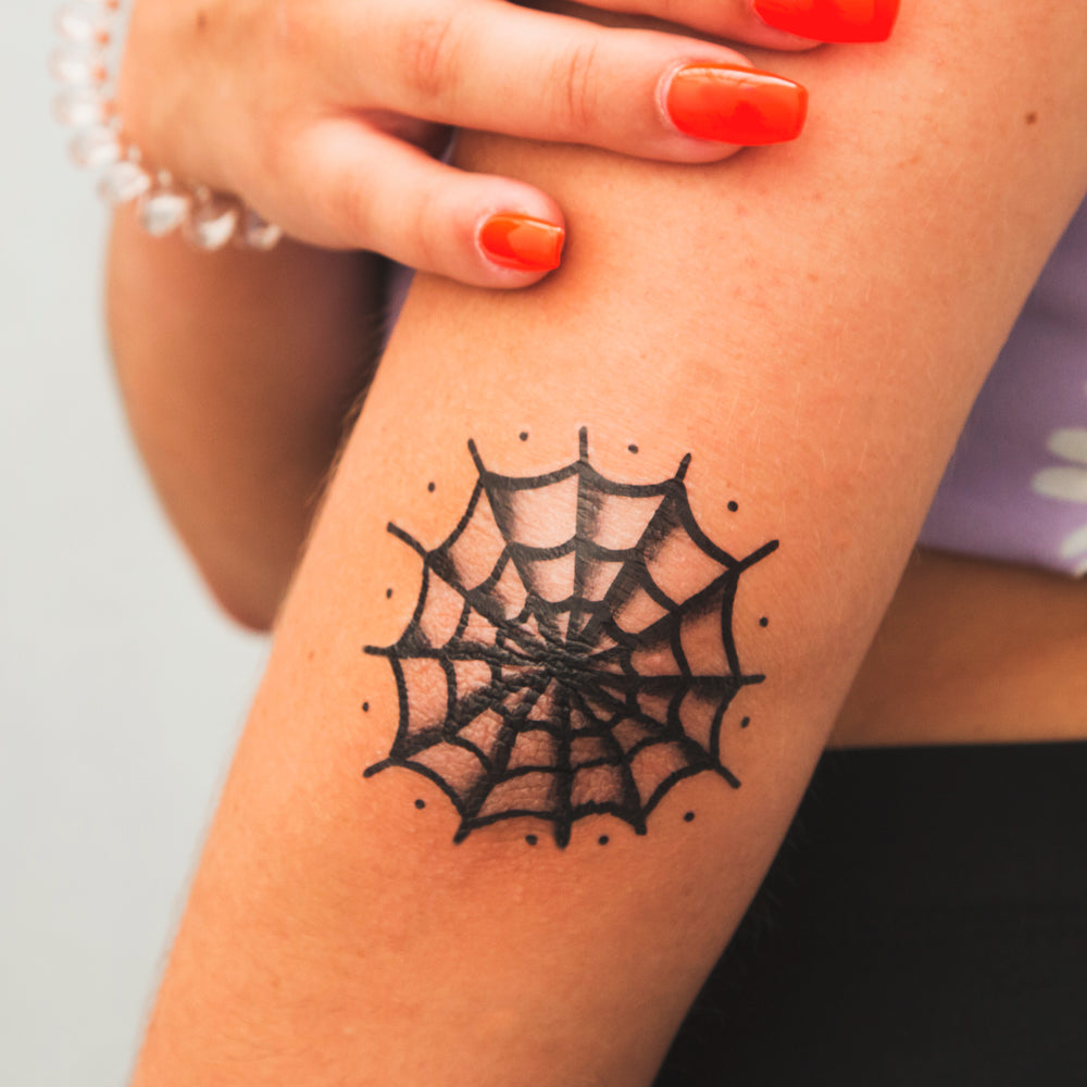 spiderweb tattoo