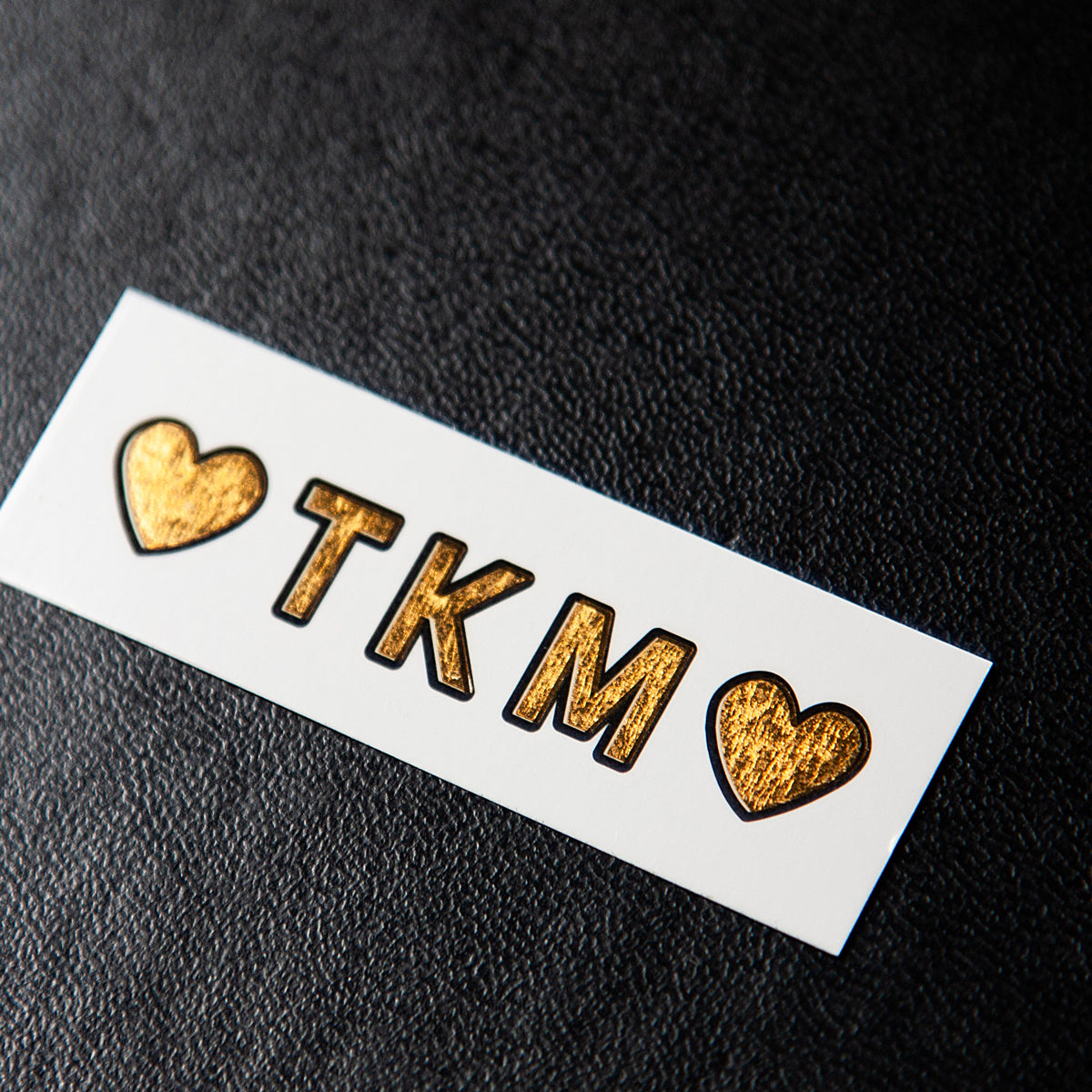 tatuaje dorado tkm
